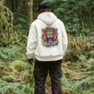 back-view-hoodie-mockup-of-an-ai-generated-man-walking-in-the-woods-m55684